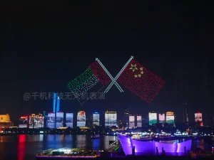 Crostars 1,000 drones forming China and UAE flags above Qingdao skyline