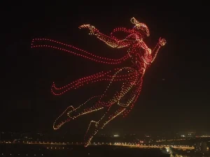 Crostars drones forming flying goddess figure above Yiwu Fotang Festival night sky, 2025