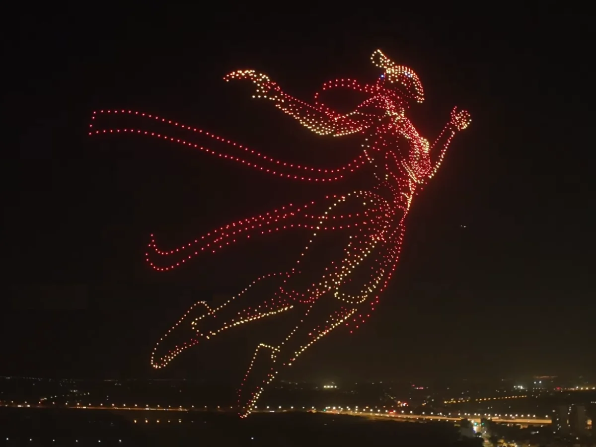 Crostars drones forming flying goddess figure above Yiwu Fotang Festival night sky, 2025